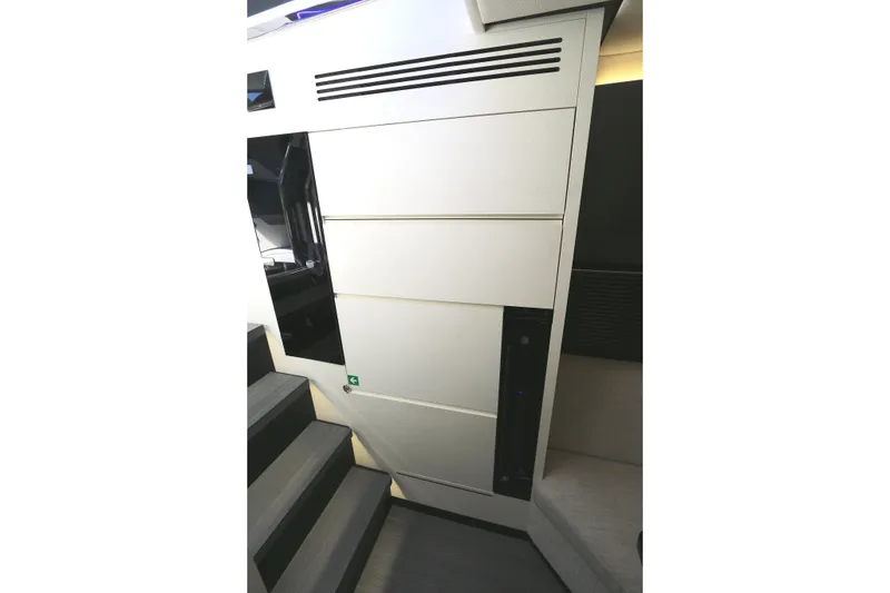 Slide: The Image of Interior view of 2023 Azimut Verve 47 yacht, featuring sleek modern cabinetry. - 6