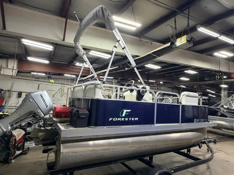 Slide: The Image of 2019 Forester 14' Fish n Fun Pontoon indoors. - 22