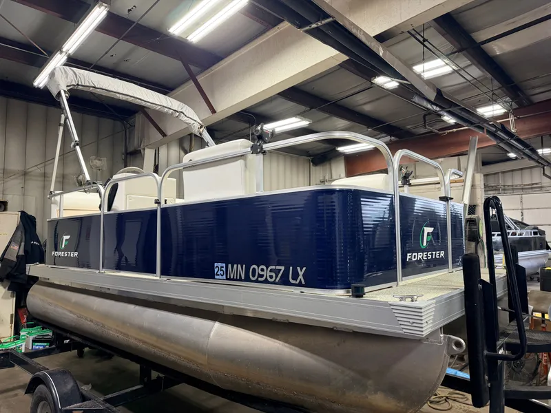 Slide: The Image of 2019 Forester 14' Fish n Fun Pontoon indoors. - 24