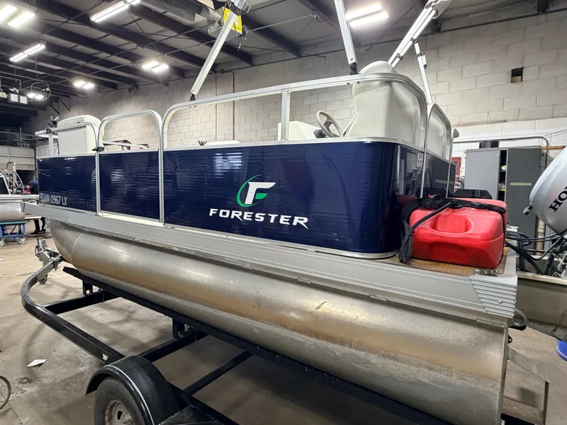 Slide: The Image of 2019 Forester 14' Fish n Fun Pontoon indoors. - 27