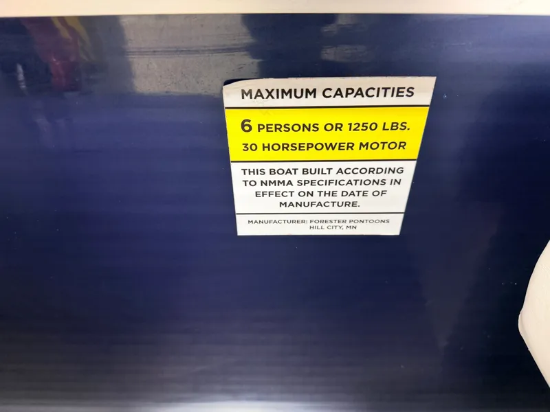 Slide: The Image of Forester Pontoon capacity: 6 persons, 1250 lbs, 30 horsepower motor. - 32