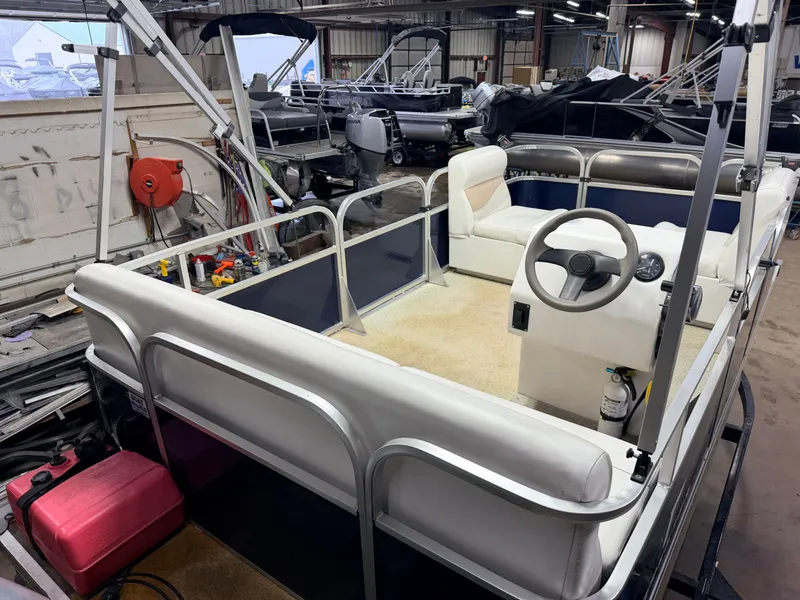 Slide: The Image of 2019 Forester 14' Fish n Fun Pontoon in storage. - 6