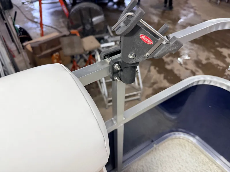 Slide: The Image of Close-up of a fishing rod holder on a Forester pontoon boat. - 9