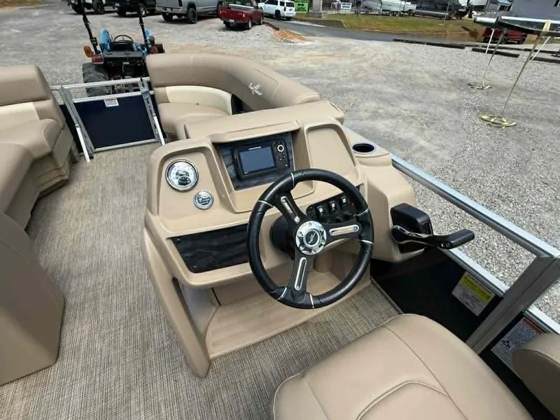 Slide: The Image of Interior of 2023 SunChaser Vista 22 LR with steering console. - 11