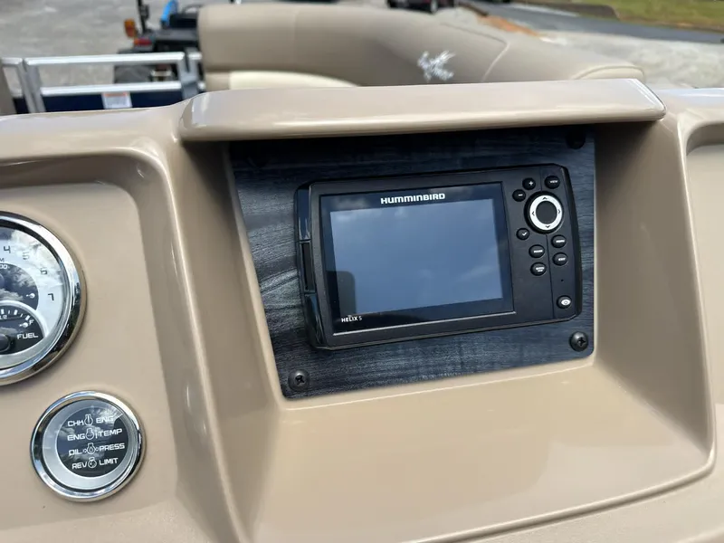 Slide: The Image of 2023 SunChaser Vista 22 LR dashboard with Humminbird GPS. - 13