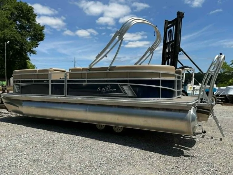 Slide: The Image of 2023 SunChaser Vista 22 LR pontoon boat on gravel lot. - 17