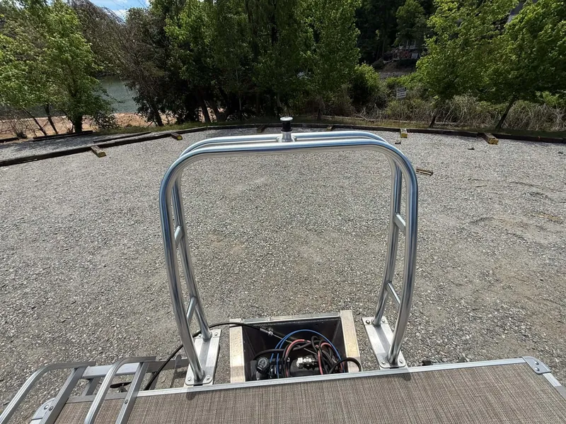 Slide: The Image of 2023 SunChaser Vista 22 LR pontoon boat rear view outdoors. - 21