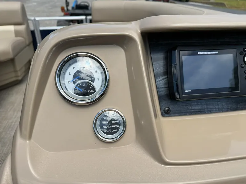 Slide: The Image of Dashboard of 2023 SunChaser Vista 22 LR with fuel gauge and display. - 22