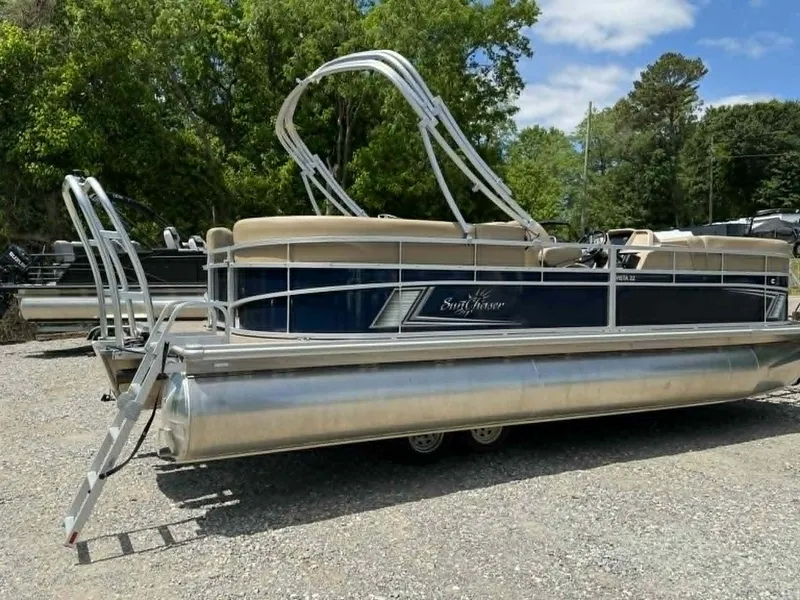 Slide: The Image of 2023 SunChaser Vista 22 LR pontoon boat on gravel surface. - 5