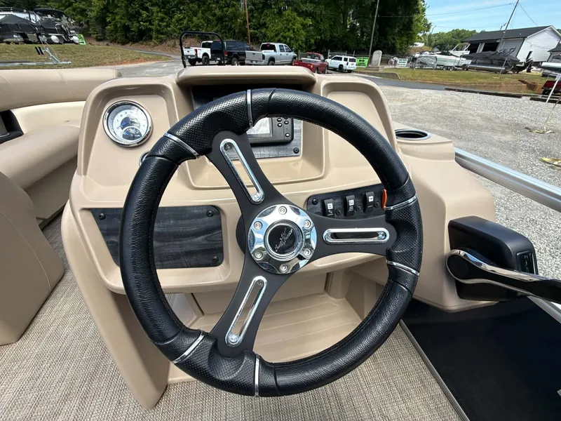 Slide: The Image of Steering wheel of the 2023 SunChaser Vista 22 LR boat. - 7