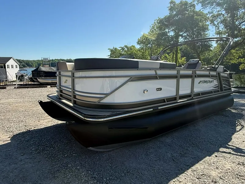 Slide: The Image of 2026 Starcraft SLS-1 R pontoon boat on gravel lot. - 10