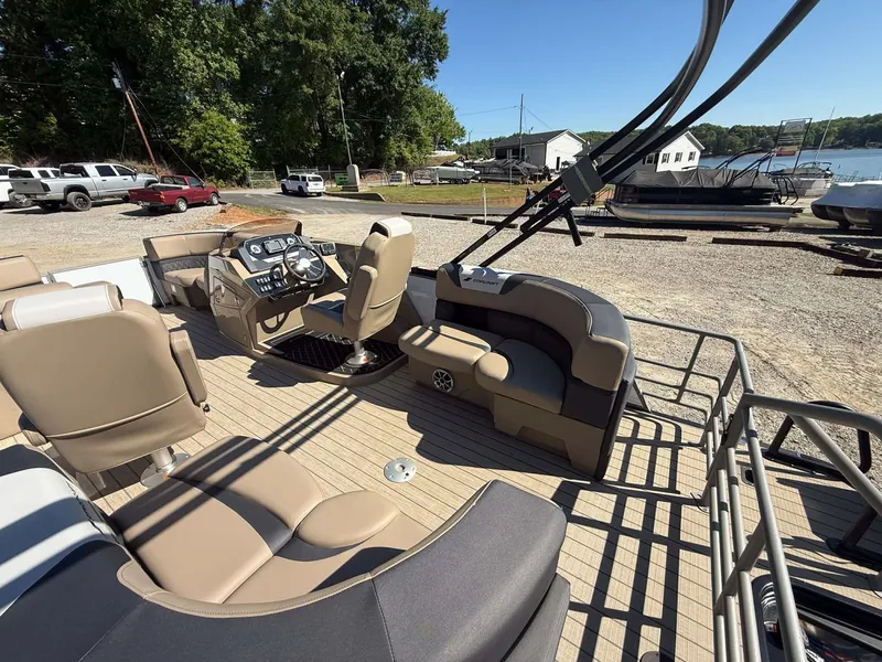 Slide: The Image of Interior of a 2026 Starcraft SLS-1 R pontoon boat at dock. - 14