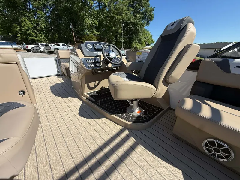 Slide: The Image of Interior of 2026 Starcraft SLS-1 R with helm console and seating. - 19