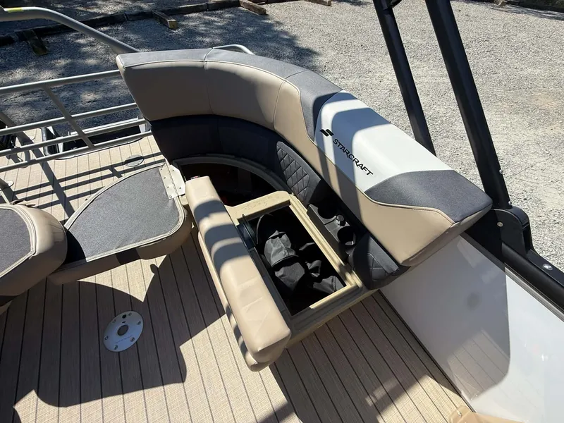 Slide: The Image of Starcraft SLS-1 R 2026 boat with seating and storage compartment. - 21