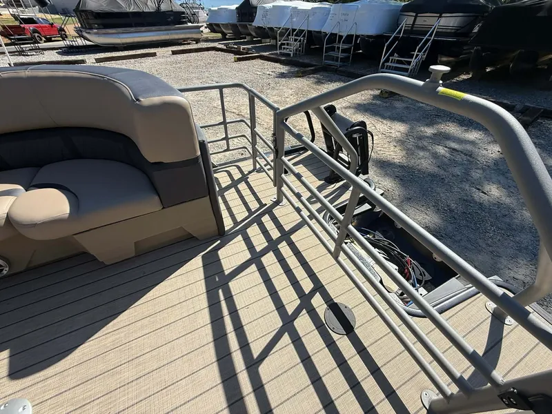Slide: The Image of Starcraft SLS-1 R 2026 pontoon boat with seating and railing. - 3