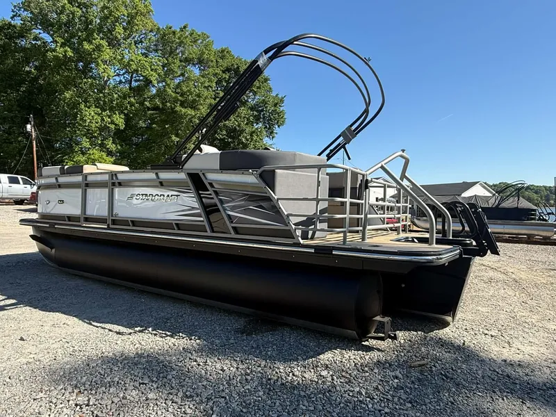 Slide: The Image of 2026 Starcraft SLS-1 R pontoon boat on gravel surface. - 4