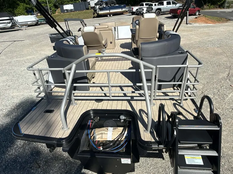 Slide: The Image of Starcraft SLS-1 R 2026 pontoon boat with spacious deck and seating area. - 7