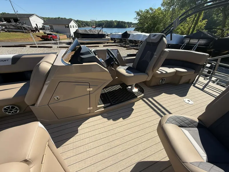 Slide: The Image of Interior of 2026 Starcraft SLS-1 R pontoon boat by the lake. - 8