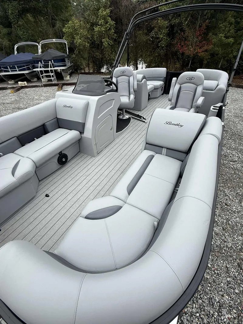 Slide: The Image of 2026 Bentley Pontoons Legacy 223 Navigator with luxurious interior seating. - 11