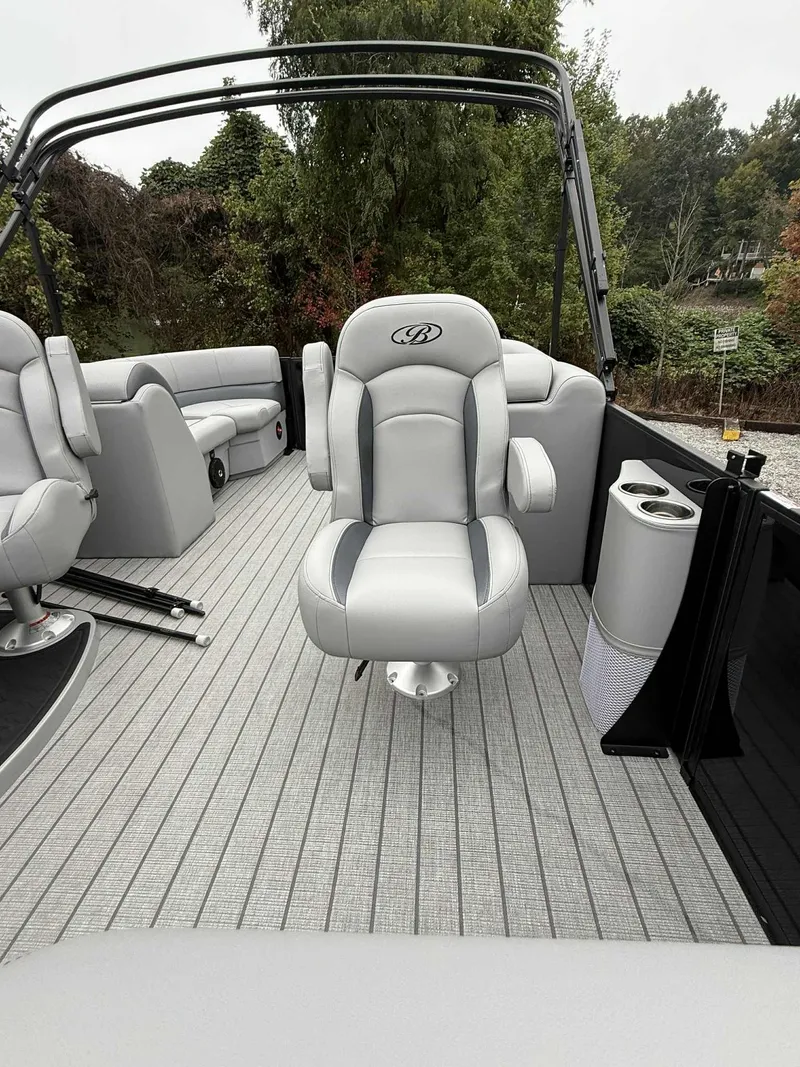 Slide: The Image of Interior of 2026 Bentley Pontoons Legacy 223 Navigator with luxurious seating. - 15