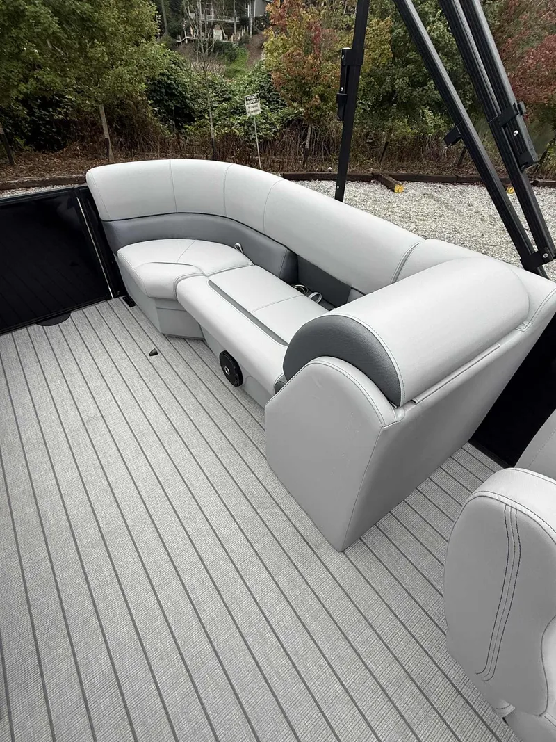 Slide: The Image of Interior of 2026 Bentley Pontoons Legacy 223 Navigator with gray seating. - 8