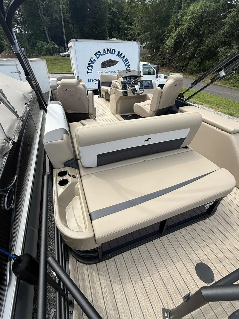 Slide: The Image of 2025 Starcraft SLS 3 Q DH pontoon boat with luxurious interior. - 3