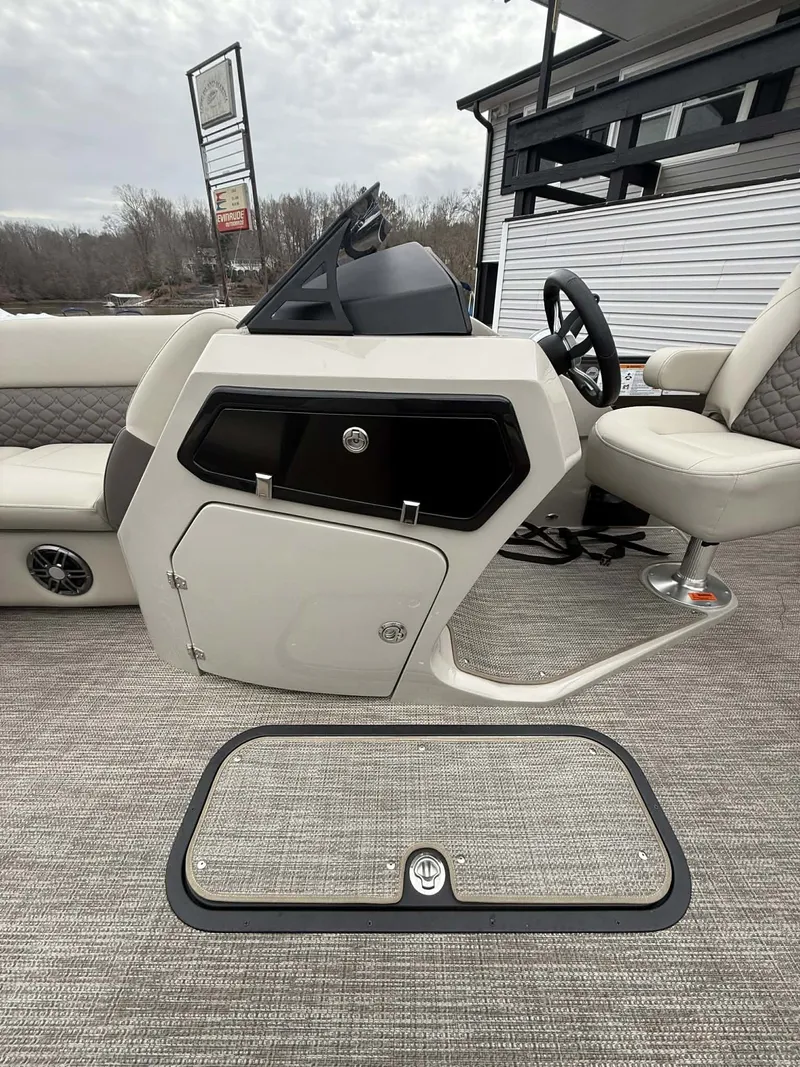 Slide: The Image of Interior view of the 2026 Manitou 23 Encore SLVPII boat. - 10