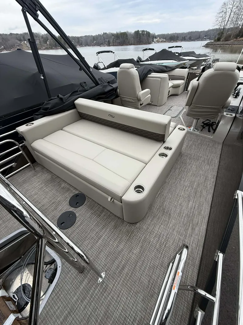 Slide: The Image of Interior of the 2026 Manitou 23 Encore SLVPII pontoon boat. - 5