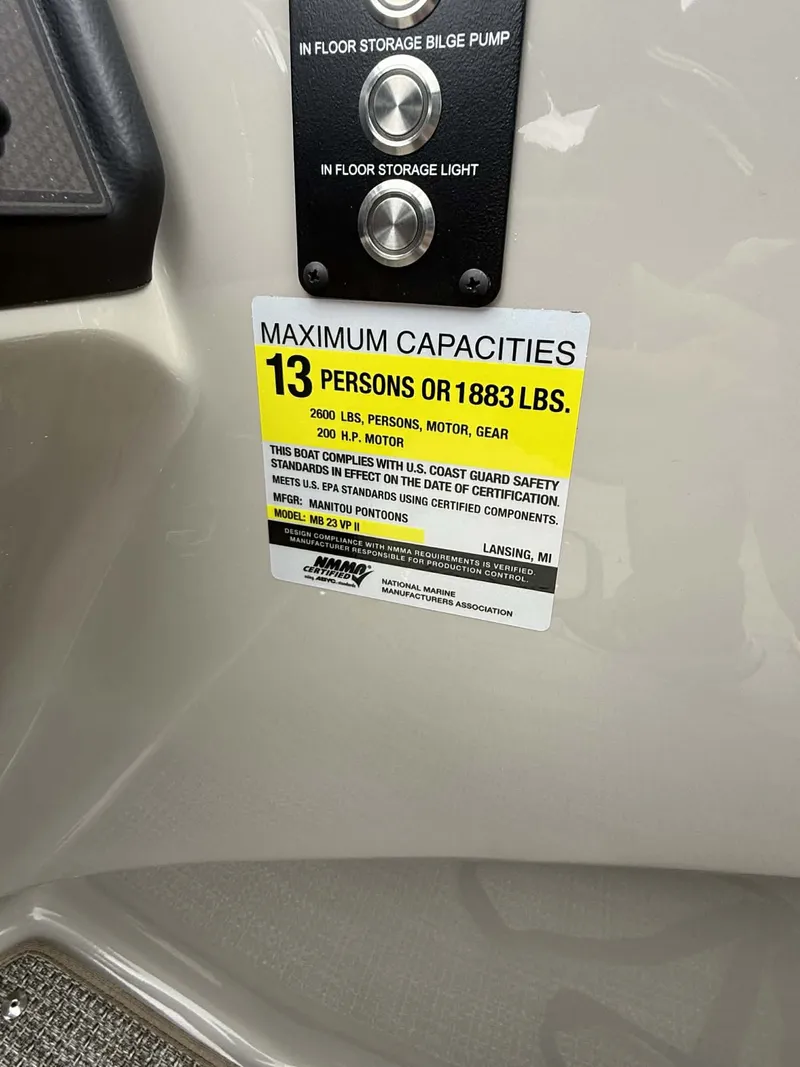 Slide: The Image of Manitou 23 Encore SLVPII boat capacity label, 13 persons or 1883 lbs. - 6