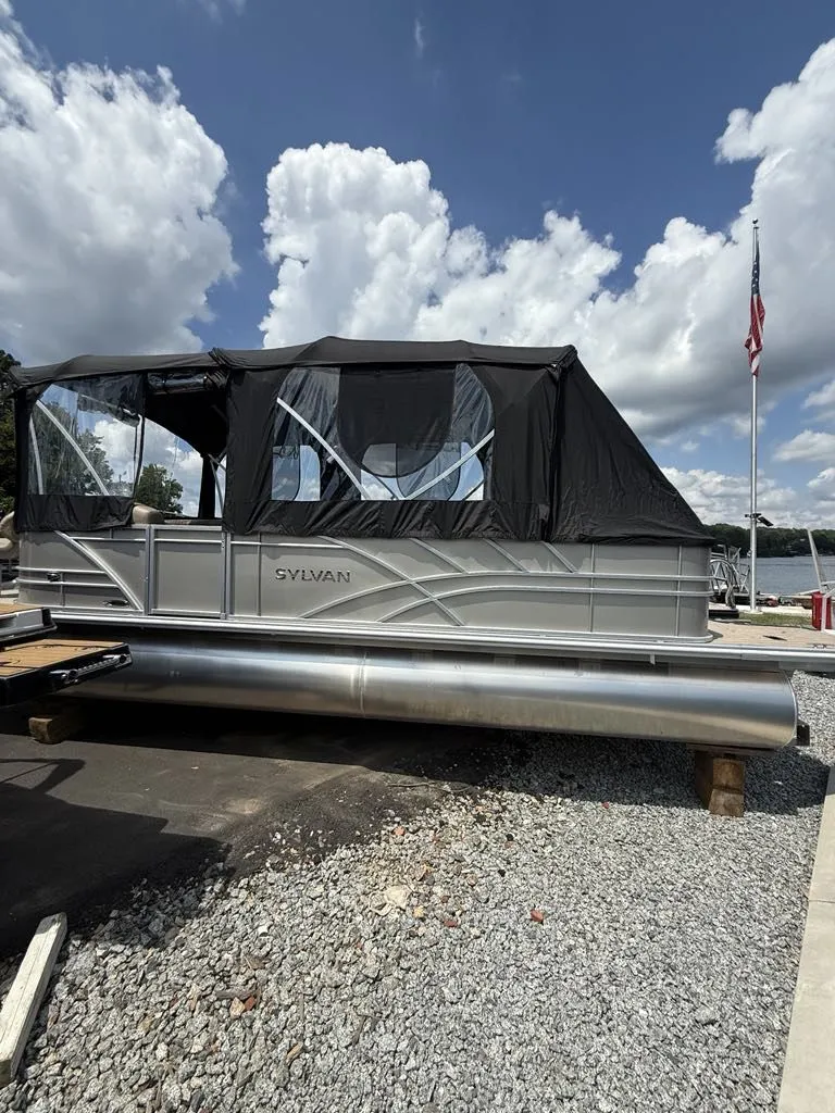 Slide: The Image of Sylvan Mirage 8524 Resorter 2025 on gravel, blue sky. - 10