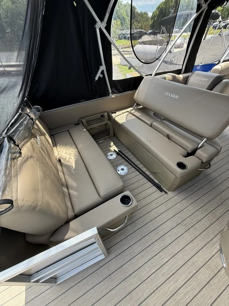 Slide: The Image of Interior of 2025 Sylvan Mirage 8524 Resorter with beige seating. - 6