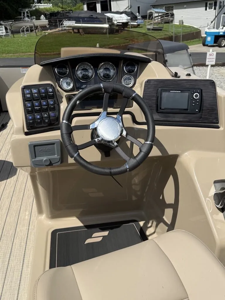 Slide: The Image of Starcraft SLS-3 boat steering console, model year 2025. - 10