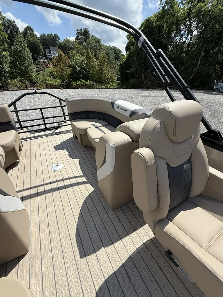 Slide: The Image of Interior of Starcraft SLS-3 pontoon boat, 2025 model, featuring luxurious seating. - 3