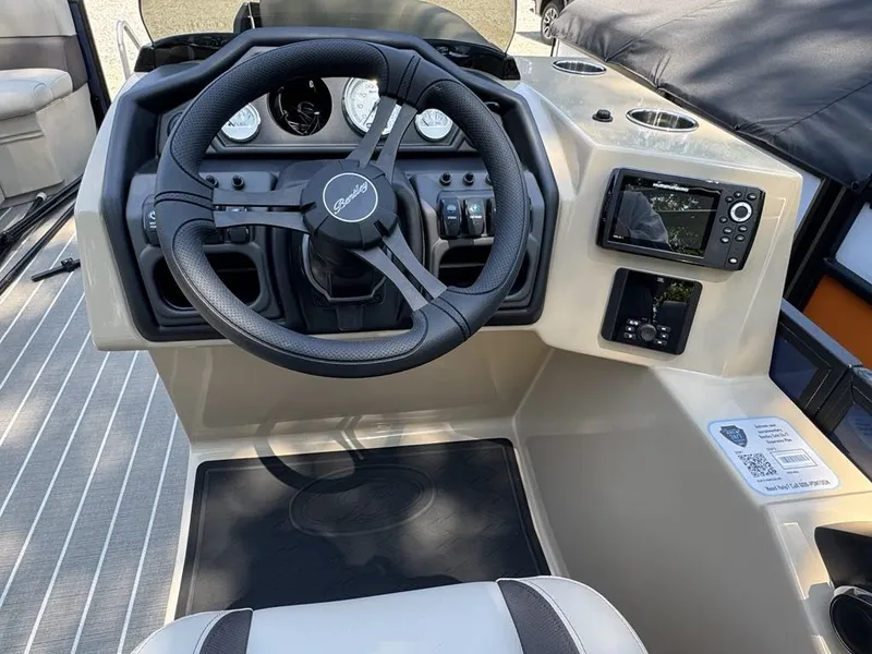 Slide: The Image of Interior of 2026 Bentley Pontoons 223 Swingback with steering wheel and instruments. - 15