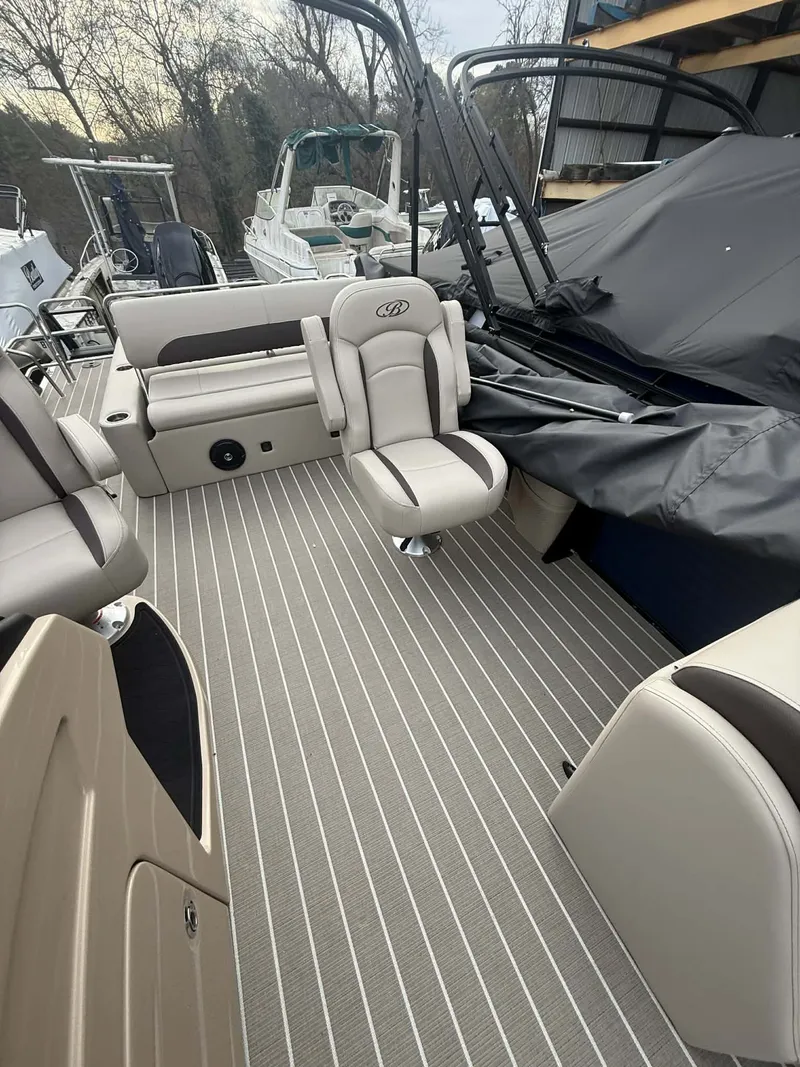 Slide: The Image of Interior of 2026 Bentley Pontoons 223 Swingback with luxurious seating. - 3