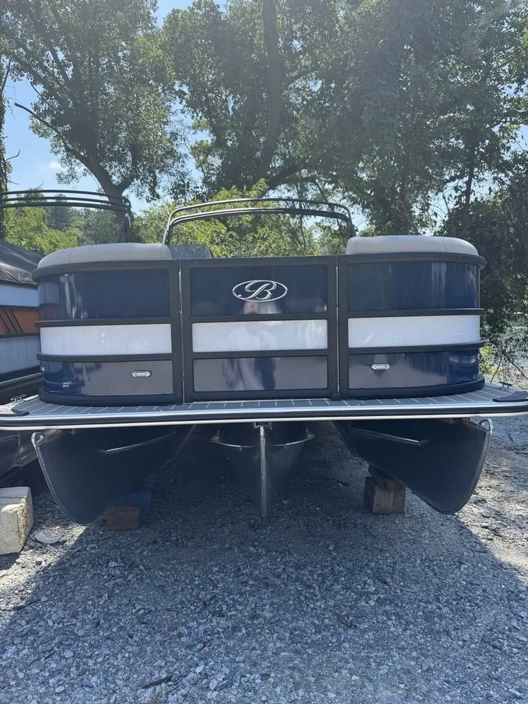 Slide: The Image of 2026 Bentley Pontoons 223 Swingback parked on gravel surface. - 4