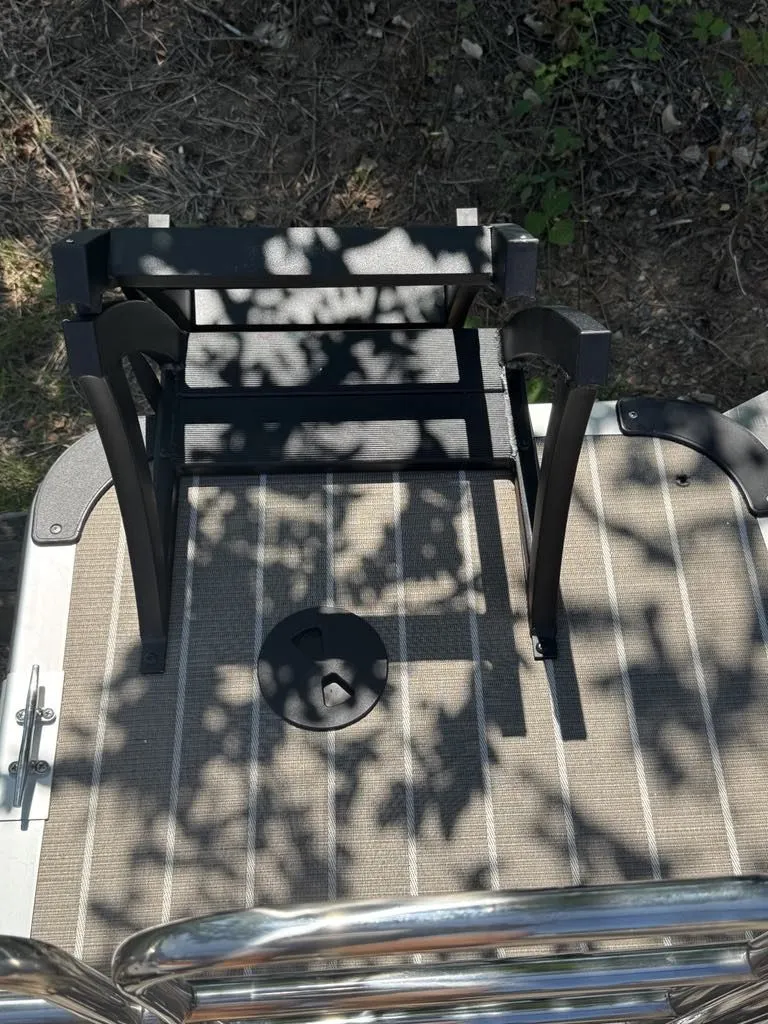 Slide: The Image of 2026 Bentley Pontoons 223 Swingback deck with shadow pattern. - 9