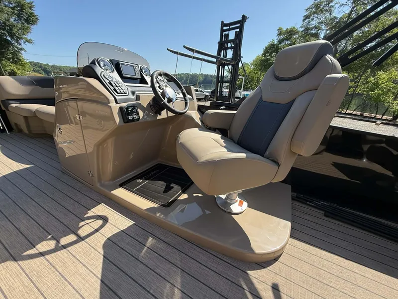 Slide: The Image of Interior of 2025 Sylvan L-3 Party Fish with luxurious captain's chair. - 10