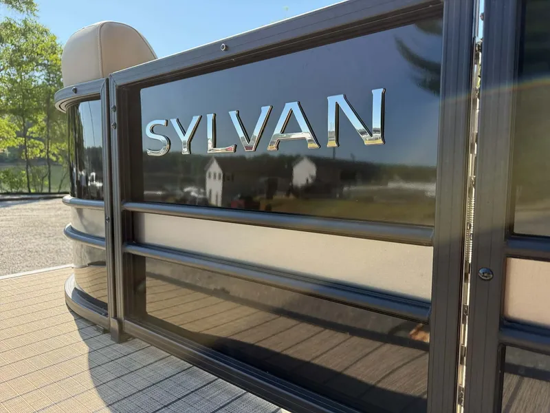 Slide: The Image of Sylvan L-3 Party Fish 2025 boat with shiny logo. - 30