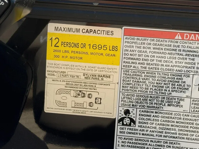 Slide: The Image of Sylvan L-3 Party Fish 2025 boat capacity label, maximum persons and weight limit. - 33