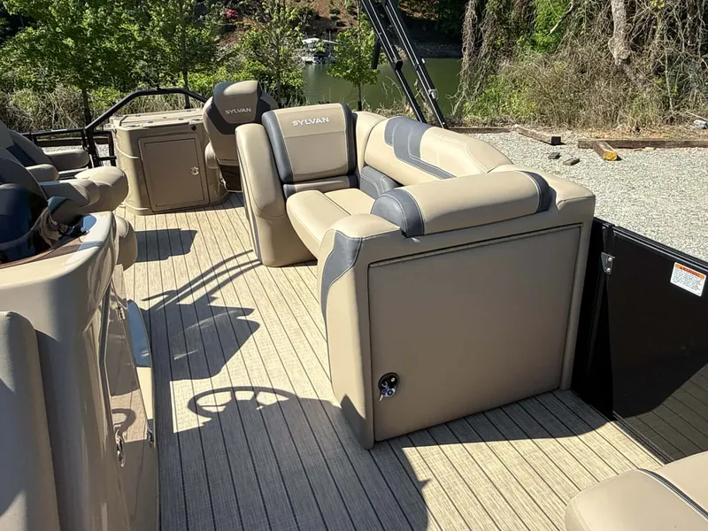 Slide: The Image of Interior of 2025 Sylvan L-3 Party Fish with beige seating. - 37