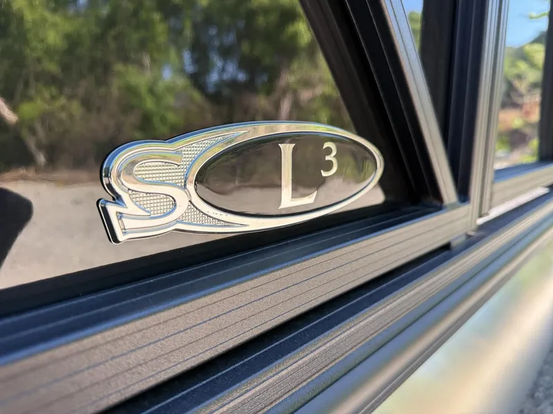 Slide: The Image of Sylvan L-3 Party Fish 2025 emblem on black background. - 45