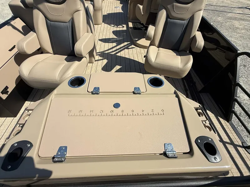 Slide: The Image of Interior of 2025 Sylvan L-3 Party Fish with beige seats. - 7
