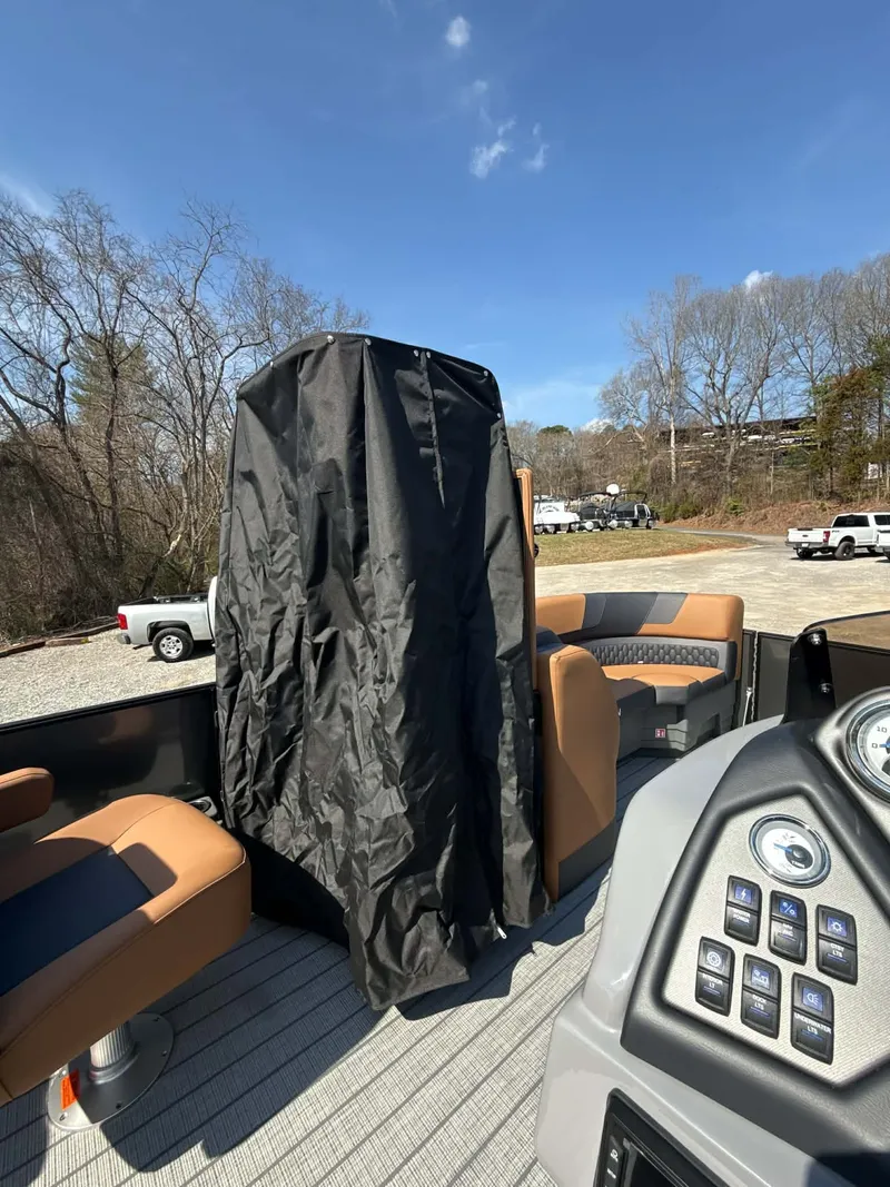 Slide: The Image of 2026 Sylvan L-3 LZ DH pontoon boat with cover and helm console. - 7