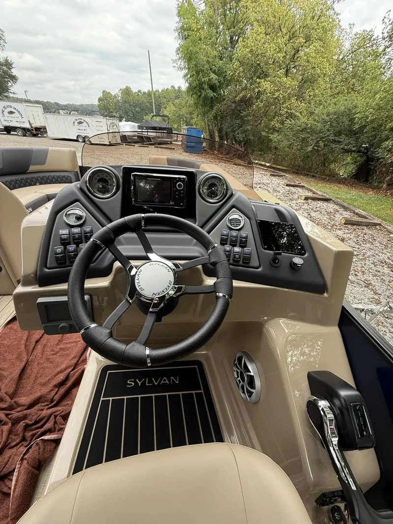 Slide: The Image of Interior view of Sylvan L-3 DLZ 2026 boat cockpit. - 9