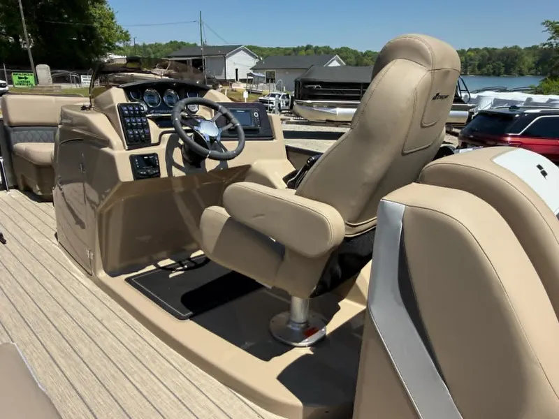Slide: The Image of Interior of a 2025 Starcraft SLS-3 boat with modern helm. - 12