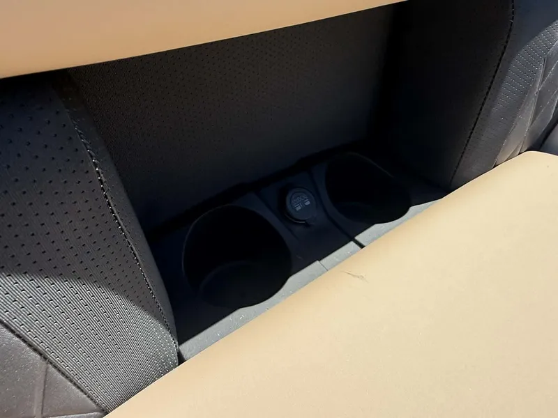 Slide: The Image of Interior of 2025 Starcraft SLS-3 with cup holders. - 19