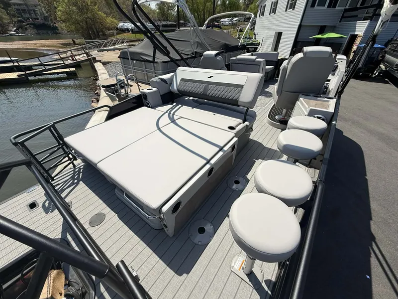 Slide: The Image of 2026 Starcraft SLS-3 DL DH Bar pontoon boat at dock. - 6