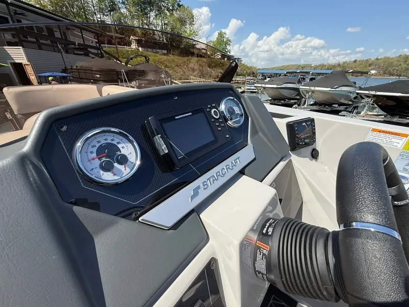 Slide: The Image of Starcraft SLS-3 DL DH Bar 2026 dashboard with tachometer and steering wheel. - 7