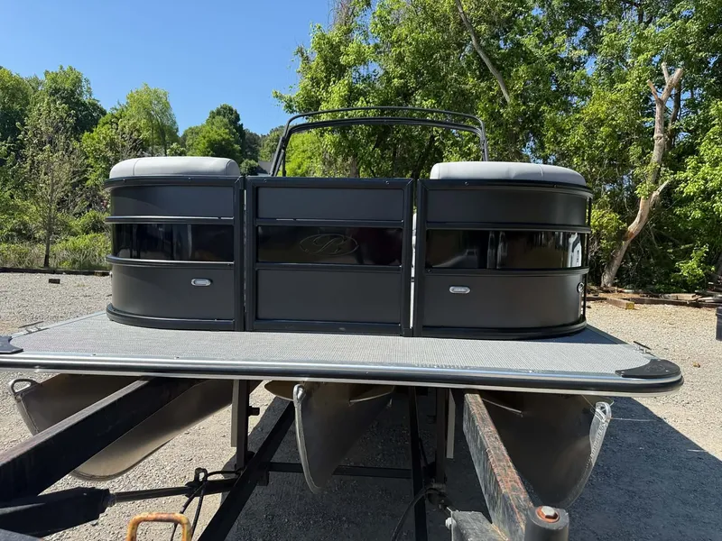 Slide: The Image of 2026 Bentley Pontoons 223 Bolt on a trailer outdoors. - 11